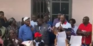 NAPO, with the microphone, addressing residents of Kumawu