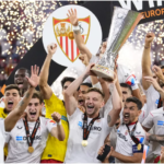 Sevilla’s team captain Ivan Rakitic lifts the trophy after winning the Europa League final soccer match between Sevilla and Roma, at the Puskas Arena in Budapest, Hungary, Wednesday, May 31, 2023. Sevilla defeated Roma 4-1 in a penalty shootout after the match ended tied 1-1. (AP Photo/Petr David Josek)(Petr David Josek / Associated Press)