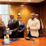 Dr Kingsley Agyemang (2nd from left), the Registrar of the Ghana Scholarship Secretariat, exchanging the signed documents with Dr Abby Parrill-Baker (left), Interim Provost of the University of Memphis. With them is Richard Gyamfi (right), Head of International Relations & Partnerships of Ghana Scholarship Secretariat