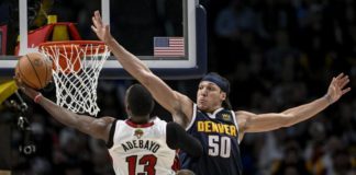 Aaron Gordon tries to block Bam Adebayo's effort