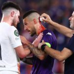 Fiorentina's Cristiano Biraghi needed treatment for a wound to the head after he struck by an object thrown from the stands during Wednesday's Europa Conference League final