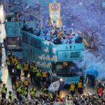 PA MEDIA Image caption: The parade was delayed by heavy rain and lightning but tens of thousands of fans turned out