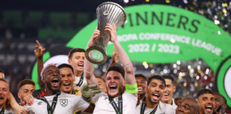 Declan Rice of West Ham United lifts the UEFA Europa Conference League trophy after the team's victory during the UEFA Europa Conference League 2022/23 final match between ACF Fiorentina and West Ham United FC at Eden Arena. Image credit: Getty Images