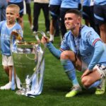 Foden and son Ronnie starred in Man City's treble celebrations Credit: Getty