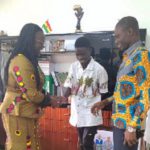 Darko Benjamin meets KNUST VC (left) with another official
