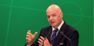 FIFA president Gianni Infantino addresses delegates during the CAF President's Outstanding Achievement Awards, in Kigali, Rwanda March 14, 2023. REUTERS/Jean Bizimana/File Photo