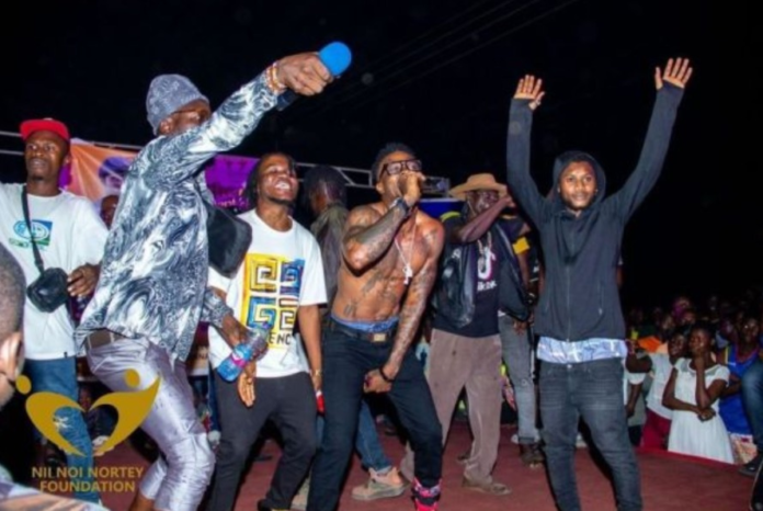 Vanisher (bare-chested) during his electrifying performance at the Ghetto Talent Hunt