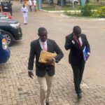 IGP leaked audio probe to be held in-camera today One of the witnesses, Sup. Eric Gyebi arrives with his lawyer.