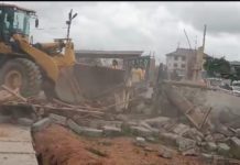 Gomoa East Assembly demolishes road-blocking structure in Gomoa Akotsi