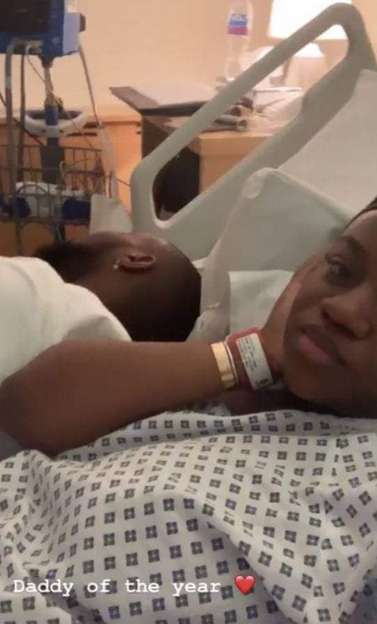 Davido sleeping by Chioma in a hospital after childbirth. This photo was taken before rumours claiming the couple had twins after their son drowned in 2022