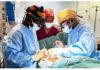 Group of doctors performing the first Coronary Artery Bypass Surgery at the UGMC