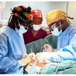 Group of doctors performing the first Coronary Artery Bypass Surgery at the UGMC