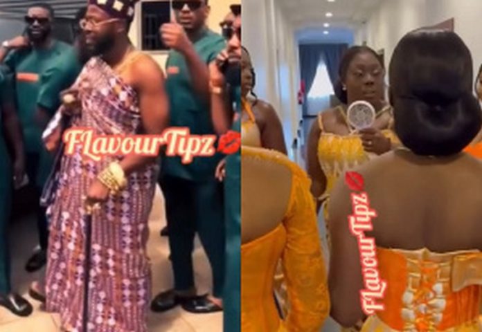 Ghanaian actor, Kalybos and wife at their traditional wedding