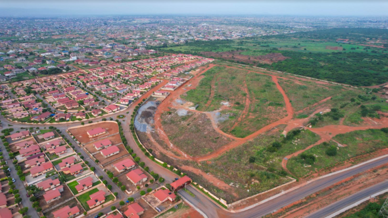 Regimanuel Gray outdoors Satellite City Project with 17,000 homes in sight