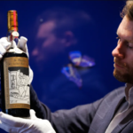 Jonny Fowle, Sotheby's global head of whisky, unveils a bottle of The Macallan 1926, the world's most expensive whisky on October 19, 2023 in London, England.