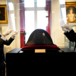 The broad black hat that Napoleon wore when he ruled 19th-century France and waged war in Europe fetched more than $2 million at auction on Sunday. Christophe Ena/AP