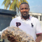 John Dumelo shows off ginger from his farm