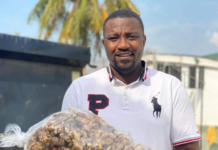 John Dumelo shows off ginger from his farm