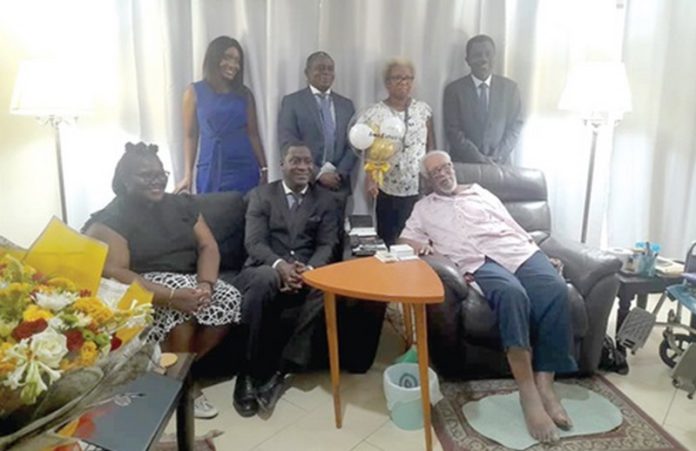 Ramses Cleland (seated middle) with other members of the delegation from the Ministry of Foreign Affairs during the celebration of the 100th birthday of Ambassador Richard Akwei (right)