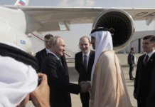 Russian President Vladimir Putin is welcomed by Minister of Foreign Affairs of the United Arab Emirates Sheikh Abdullah bin Zayed bin Sultan Al Nahyan upon arrival at the Abu Dhabi International Airport, United Arab Emirates December 6, 2023. Sputnik/Andrey Gordeev/Pool via REUTERS Acquire Licensing Rights