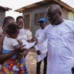 Mother of the boy, and Mike Ocquaye (Middle)