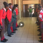 South African students welcome their Nigerian Teacher with a guard of honour, after Nigeria beat South Africa in the AFCON.