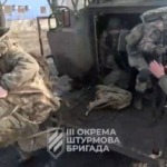 [1/6] Ukrainian soldiers get out of a military vehicle in a location given as Avdiivka, Donetsk Region, Ukraine, in this screen grab taken from a video released February 17, 2024. 3Rd Assault Brigade/Handout via REUTERS Purchase Licensing Rights