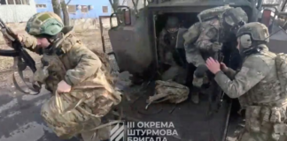 [1/6] Ukrainian soldiers get out of a military vehicle in a location given as Avdiivka, Donetsk Region, Ukraine, in this screen grab taken from a video released February 17, 2024. 3Rd Assault Brigade/Handout via REUTERS Purchase Licensing Rights