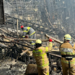 Members of the Russian Emergencies Ministry clear rubble at the Crocus City Hall concert venue in Moscow on March 23. Russian Emergencies Ministry via Reuters