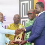 President Akufo-Addo (left) receiving a citation from Dr Yaw Adutwum after the launch of the NSS Policy in Accra. With them are Osei Assibey Antwi (2nd from left) and Nii Odoi Tetteyfio, Board Chairman, NSS. Picture: SAMUEL TEI ADANO