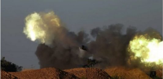 Israeli artillery units fire at an undisclosed target in the Gaza Strip on 7 May 2024.