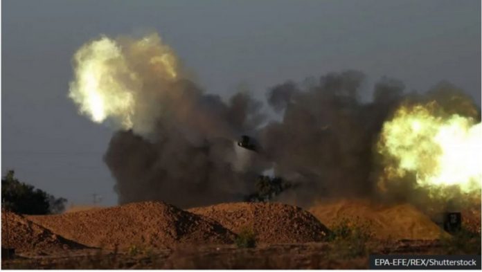 Israeli artillery units fire at an undisclosed target in the Gaza Strip on 7 May 2024.