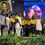 Dominion Christian Academy DCA gifts handmade artwork to Duncan-Williams on 67th birthday