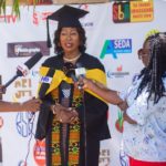 Mrs Gladys Desbordes-Hill being interviewed after her graduation