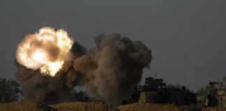 An Israeli mobile artillery unit fires a shell from southern Israel towards the Gaza Strip, in a position near the Israel-Gaza border, Tuesday, May 7, 2024. (AP Photo/Leo Correa)ASSOCIATED PRESS