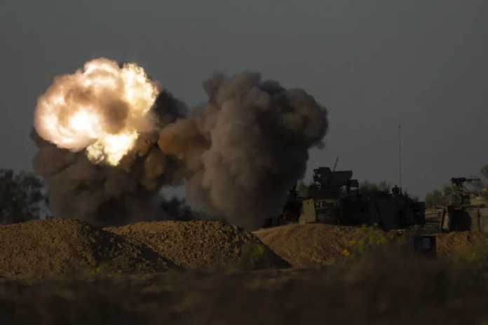 An Israeli mobile artillery unit fires a shell from southern Israel towards the Gaza Strip, in a position near the Israel-Gaza border, Tuesday, May 7, 2024. (AP Photo/Leo Correa)ASSOCIATED PRESS