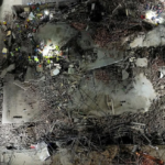 A drone view of the scene of a building collapse where several construction workers are thought to be trapped in George, South Africa May 6, 2024. Shafiek Tassiem/Reuters