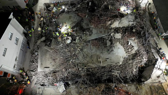 A drone view of the scene of a building collapse where several construction workers are thought to be trapped in George, South Africa May 6, 2024. Shafiek Tassiem/Reuters