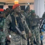 Americans among plotters in foiled coup attempt – DR Congo Military A man in military fatigues speaks as others stand next to him inside the Palace of the Nation during an attempted coup in Kinshasa, Democratic Republic of Congo, May 19, 2024, in this screen grab from a social media video. Christian Malanga/Reuters