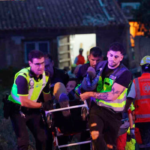 Medics taking injured people from a building that collapsed in Playa de Palma on the Spanish Mediterranean island of Mallorca. Picture: Isaac Buj/Europa Press/AP