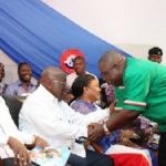 Then NDC member Koku Anyidoho greets Akufo-Addo at an NPP event - File photo