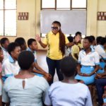 MTN staff volunteer engaging with students of Christ the King SHS in the Ashanti region