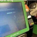 A Woolworth check out screen affected by the outage.