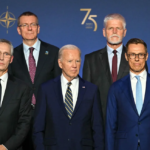 President Joe Biden, flanked by NATO Secretary General Jens Stoltenberg, left, and President of Finland Alexander Stubbs, right, stands with NATO leaders for a group photo during the NATO 75th Anniversary Celebratory Event at the Mellon Auditorium in Washington, DC, on July 9. Saul Loeb/AFP/Getty Images