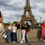 Asking someone to take a photo for you? Say "bonjour" first. Maja Hitij/Getty Images