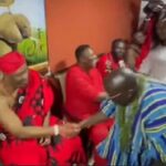 Vice President Dr. Bawumia (in smock) exchanging pleasantries with the Ga Mantse