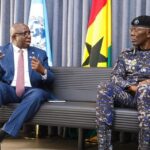Inspector-General of Police Dr. George Akuffo Dampare (right) having an interaction with Assistant Inspector-General of Police (Rtd) Garba Baba Umar