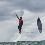 Brazil's Gabriel Medina reacts after getting a large wave in the 5th heat of the men's surfing round three in Teahupo'o during the Paris 2024 Olympic Games (Credit: Getty Images)