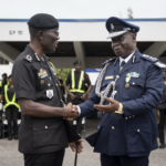 Mr. William Fayia Sellu, IGP of Police of Sierra Leone in a chat with Dr. George Akuffo Dampare, IGP of Ghana.