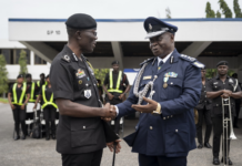 Mr. William Fayia Sellu, IGP of Police of Sierra Leone in a chat with Dr. George Akuffo Dampare, IGP of Ghana.